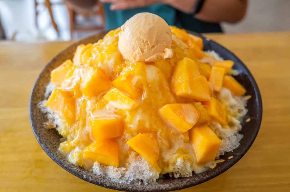 bowl of shaved ice with mango